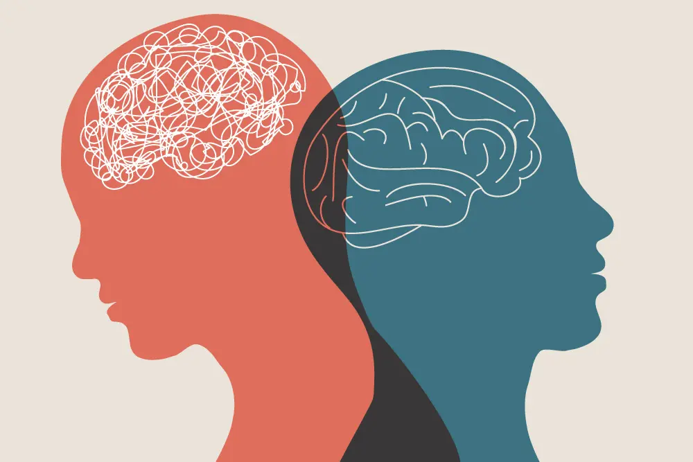 Illustration of two overlapping silhouettes in profile. One is red with a tangled line representing a chaotic brain, and the other is blue with a clear line sketch of a brain, symbolizing clarity or calmness.